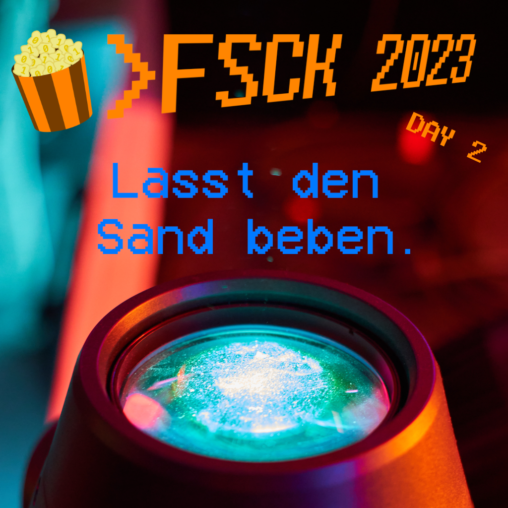 Das Cover-Bild vom zweiten FSCK-Set. Im Hintergrund ist eine Nahaufnahme eines Moving Heads zu sehen, das bläulich-grüne Licht leuchtet nach oben.
Text im Bild: "FSCK 2023 Day 2: Lasst den Sand beben"